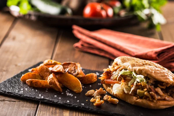 Chicken doner kebab with potatoes — Stock Photo, Image
