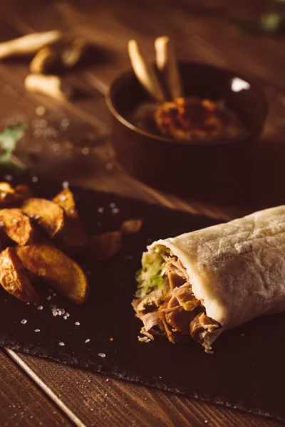 Shawarma with fried potato on table — Stock Photo, Image