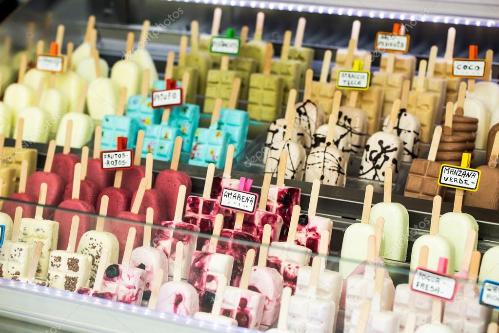 Variety of popsicles in shop Stock Photo by ©alexsalcedo 107536862