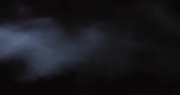 Atmospheric smoke 4K Fog effect. Smoke in slow motion on black background. White smoke slowly floating through space against black background