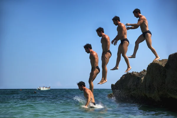 Man jumping in water — Stock Photo, Image