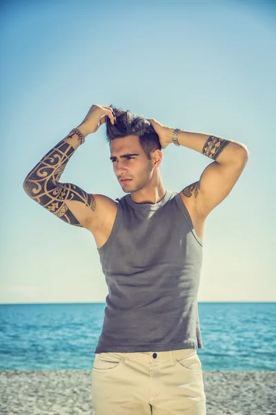 Young Man at Beach in Sunny Summer Day — Stock Photo, Image