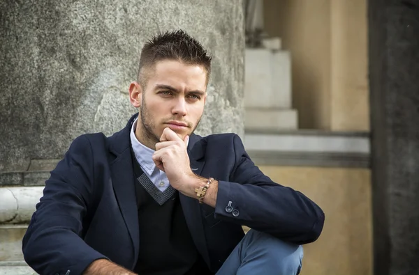 Handsome young man outdoor in jacket and shirt — Stock Photo, Image