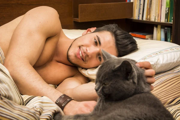 Handsome Young Man Cuddling his Gray Cat Pet — Stock Photo, Image