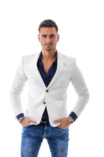 Young man with elegant white jacket and jeans — Stock Photo, Image