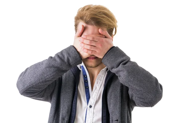 Man hiding eyes with hands — Stock Photo, Image