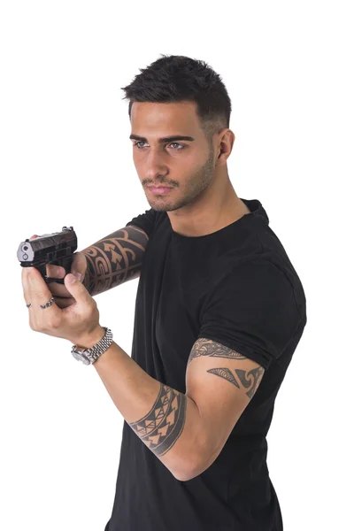 Jeune homme pointant pistolet, — Photo