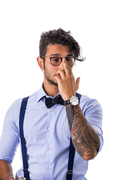 Stijlvolle verlegen hipster in glazen — Stockfoto