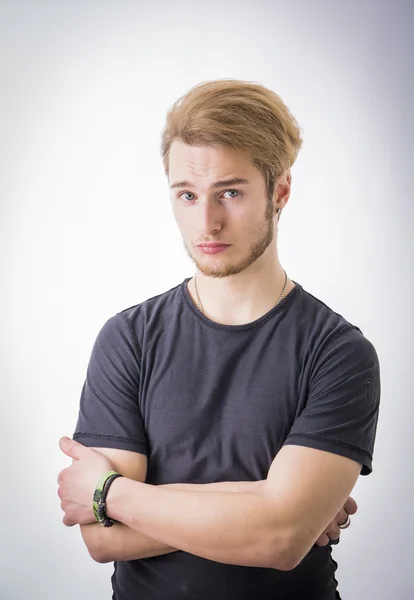 Sad or worried handsome young man — Stock Photo, Image