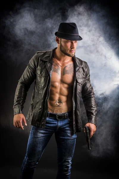 Man wearing leather jacket on naked muscular torso — Stok Foto