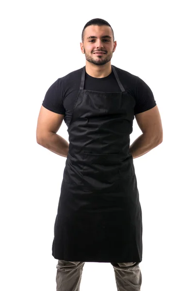 Портрет красивого шеф-кухаря в чорному фартуху — стокове фото