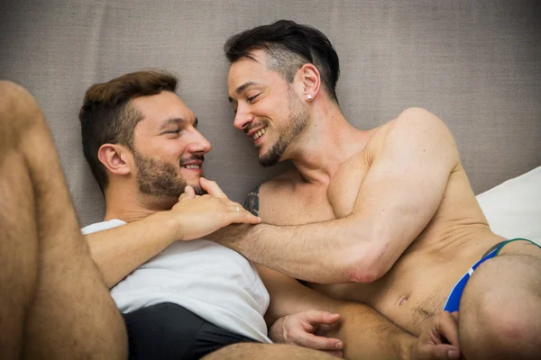 Gay couple in bed — Stock Photo, Image