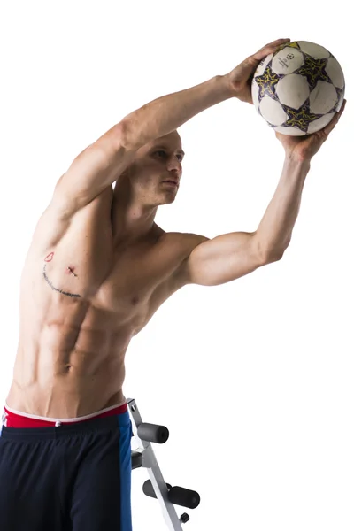 Man Exercising with Medicine Ball in Studio — Stock Photo, Image