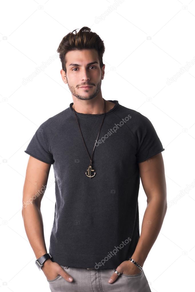 Fit handsome young man standing confident in casual clothes isolated