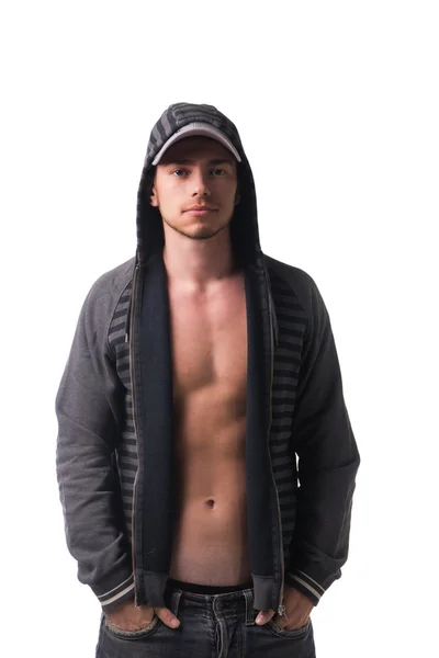 Attractive young man in hoodie jacket open on naked chest — Stok Foto