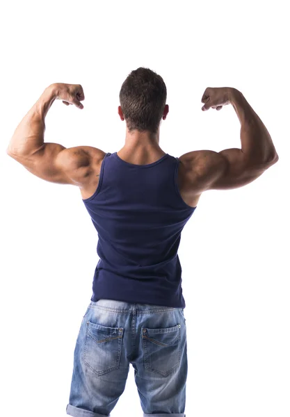 Aantrekkelijke gespierde man een pose, opvallend weergegeven: rug en biceps — Stockfoto