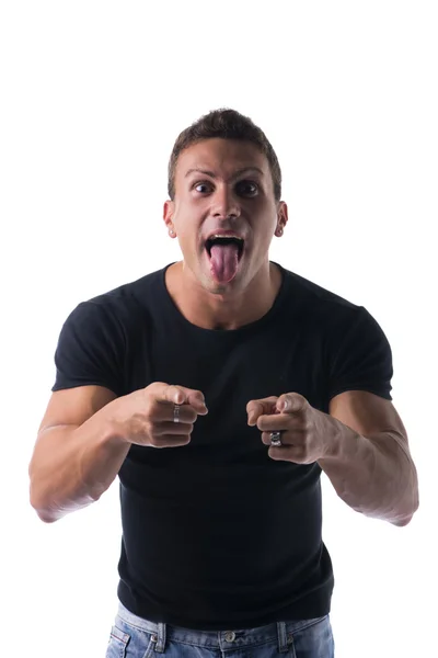 Funny Hunk Man with Tongue Out Pointing at Camera — Stock Photo, Image