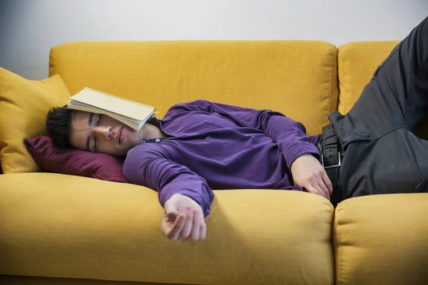 Over-worked, tired young man — Stock Photo, Image