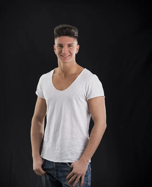 Trendy young man in white t-shirt — Stok Foto