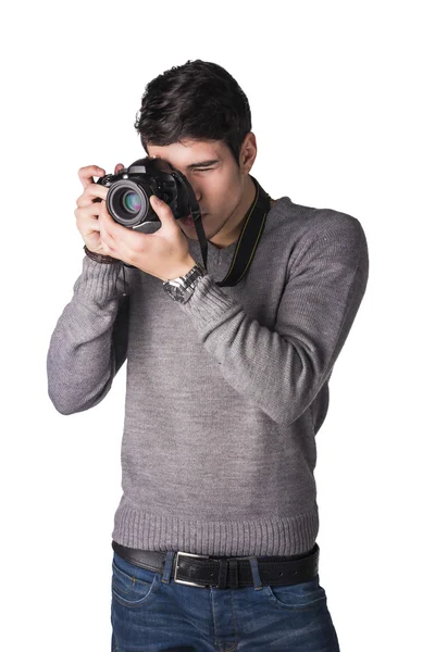 Przystojny młody mężczyzna fotograf biorąc fotografii — Zdjęcie stockowe