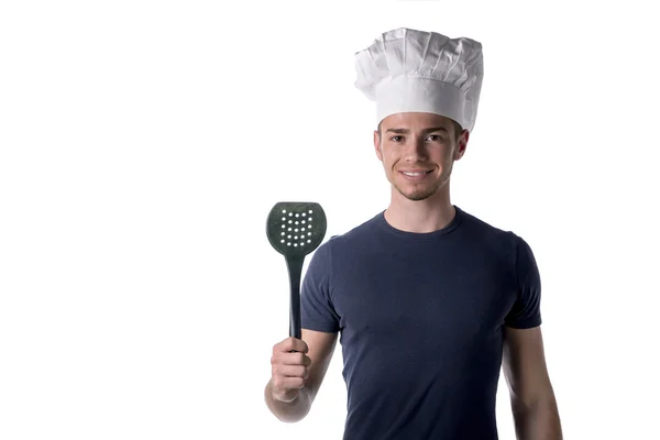 Hombre cocinero sombrero blanco con negra cucharón en mano —  Fotos de Stock