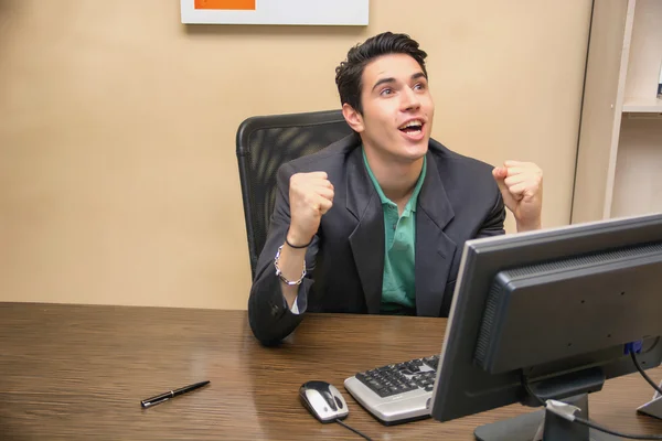 Happy young businessman screaming for joy — Stock Photo, Image