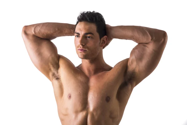 Muscular Man Holding his Head Showing Bulging Biceps — Stock Photo, Image