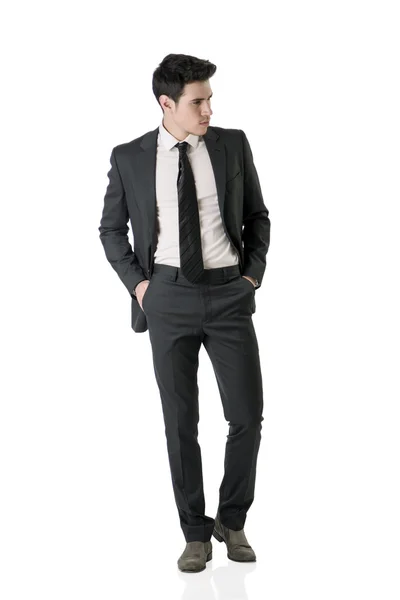 Full figure shot of handsome elegant young man in business suit — Stock Photo, Image