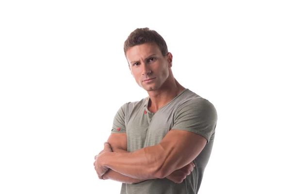 Fit handsome young man standing confident with arms crossed — Stock Photo, Image