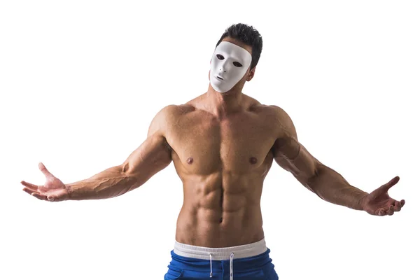 Shirtless muscle man with creepy, scary mask on tilted head — Stock Photo, Image