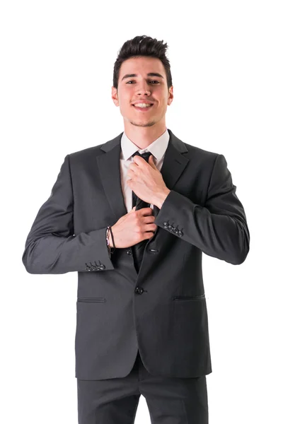 Joven hombre de negocios con confianza posando aislado en blanco — Foto de Stock