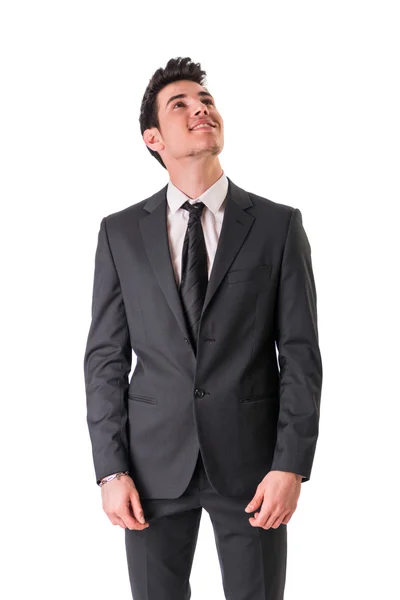 Jovem empresário confiantemente posando isolado no branco — Fotografia de Stock
