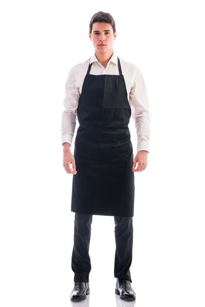 Volledige shot van jonge chef-kok of ober poseren — Stockfoto
