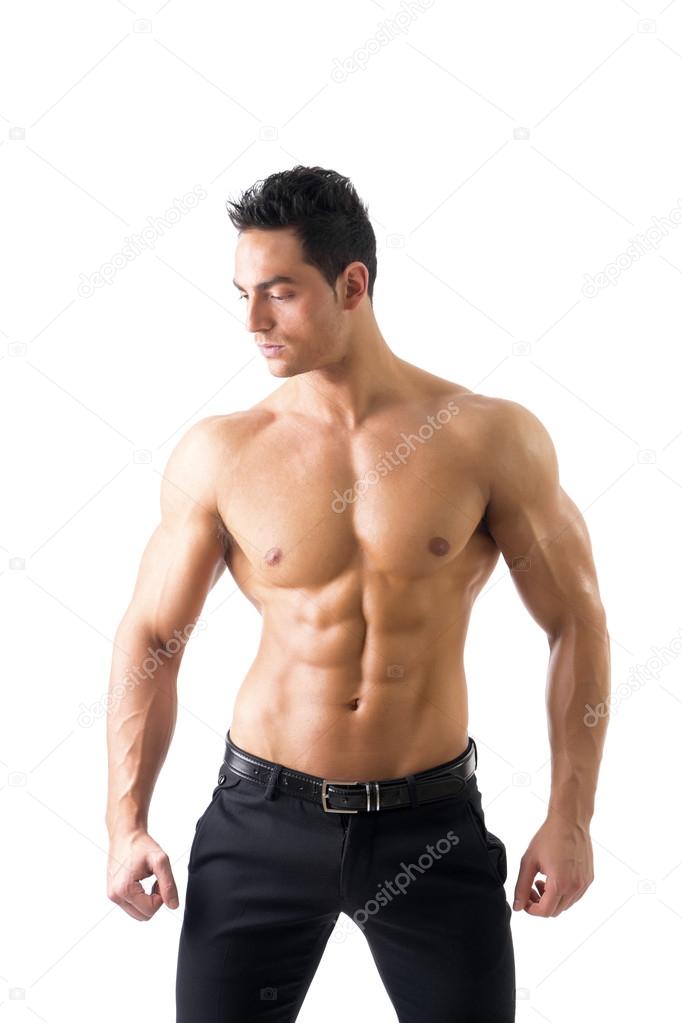 Handsome topless muscular man standing, isolated