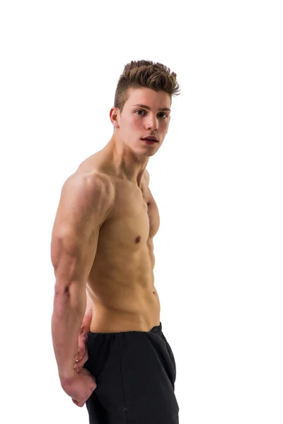 Yakışıklı vücut geliştirmeci triceps poz yapıyor — Stok fotoğraf
