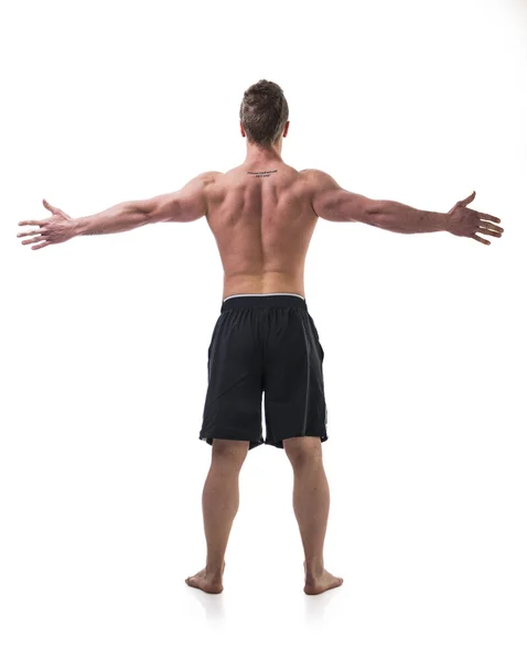 Muscle man shirtless with arms spread open — Stock Photo, Image