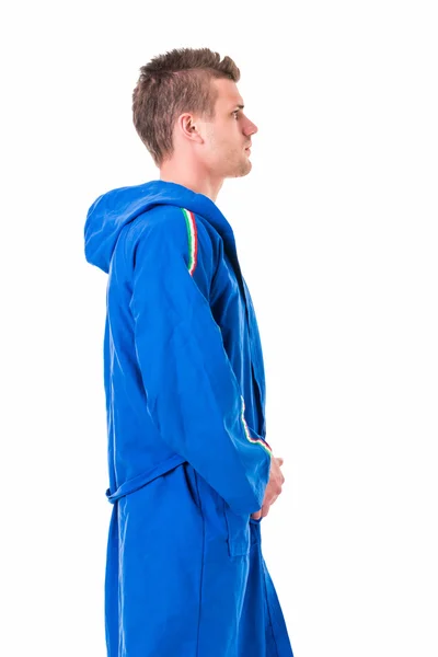 Handsome young man wearing blue bathrobe — Stock Photo, Image