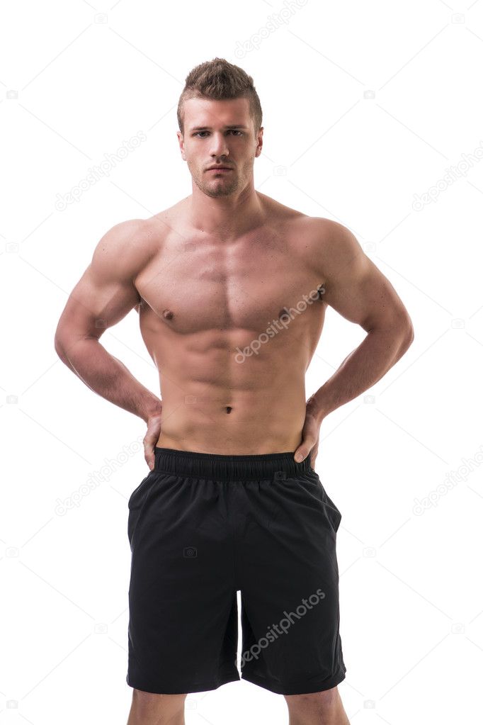 Handsome, muscular shirtless young man with shorts