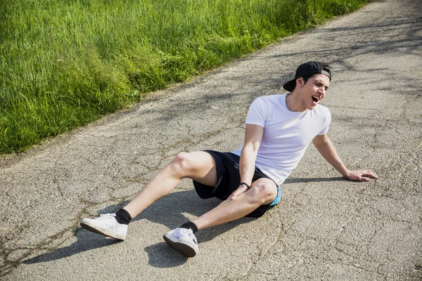 Man gewond tijdens het gebruik en joggen — Stockfoto