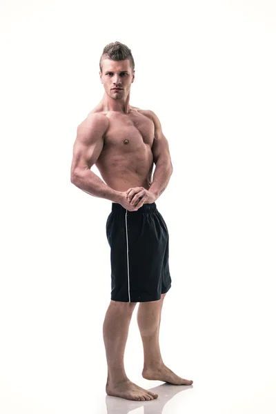 Handsome young bodybuilder in relaxed pose — Stock Photo, Image