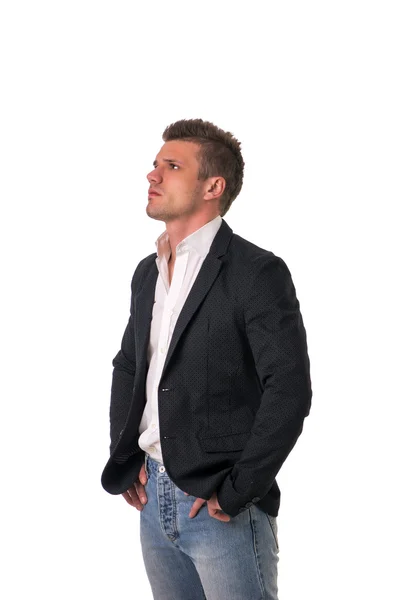 Man wearing dark jacket, white shirt and jeans — Stock Photo, Image