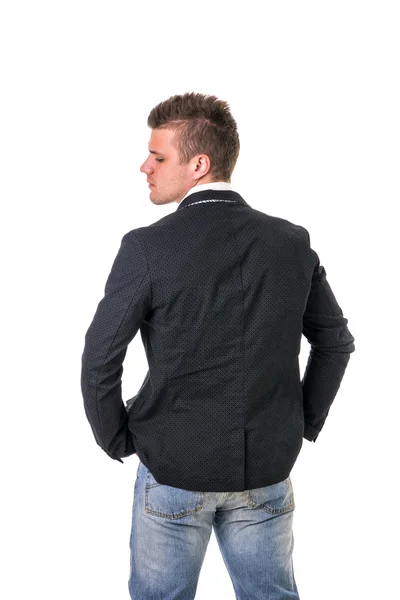 Man wearing dark jacket, white shirt and jeans — Stock Photo, Image