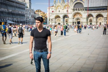 Young Man in San Marco Square in Venice, Italy
