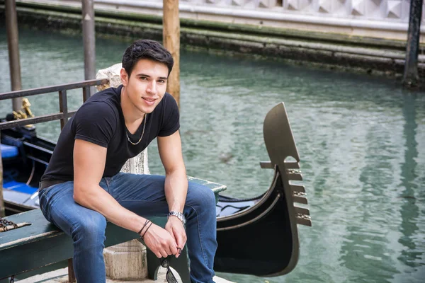 Young Man Sitting Next to Canal in Venice, Italy — Stok fotoğraf