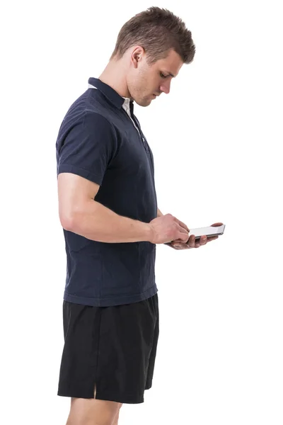 Handsome young personal trainer with tablet PC — Stockfoto