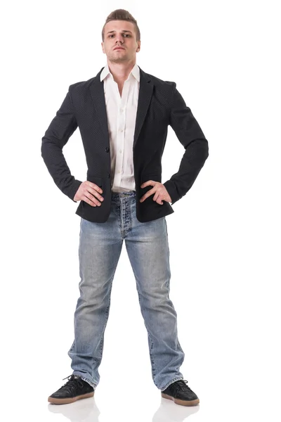 Повний знімок тіла привабливого молодого чоловіка з піджаком і джинсами — стокове фото