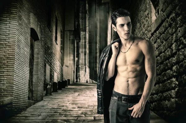 Young Vampire Man in an Open Black Leather Jacket, Showing Chest and Abs — Stock Photo, Image