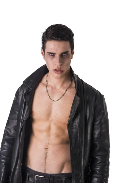 Young Vampire Man in an Open Black Leather Jacket, Showing his Chest and Abs — kuvapankkivalokuva