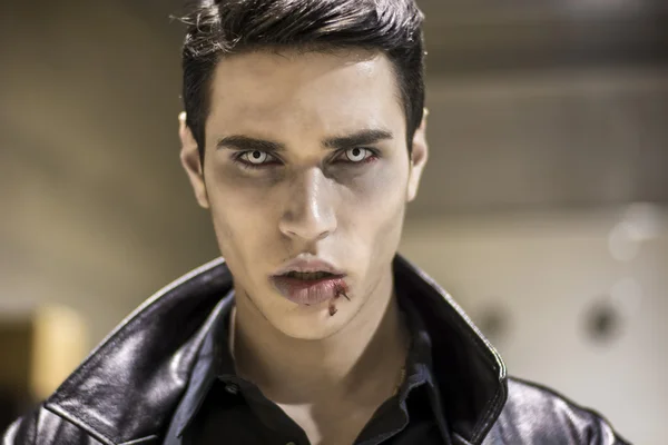 Young Vampire Man Face with Blood on his Mouth — Fotografie, imagine de stoc