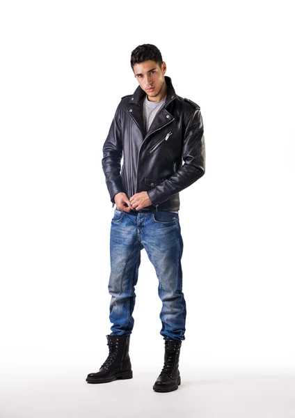 Handsome young man wearing leather jacket, t-shirt and jeans — Stock Photo, Image